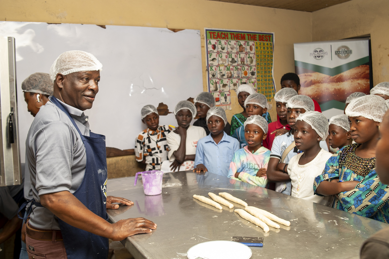 Students Learning from a chef at Summer School