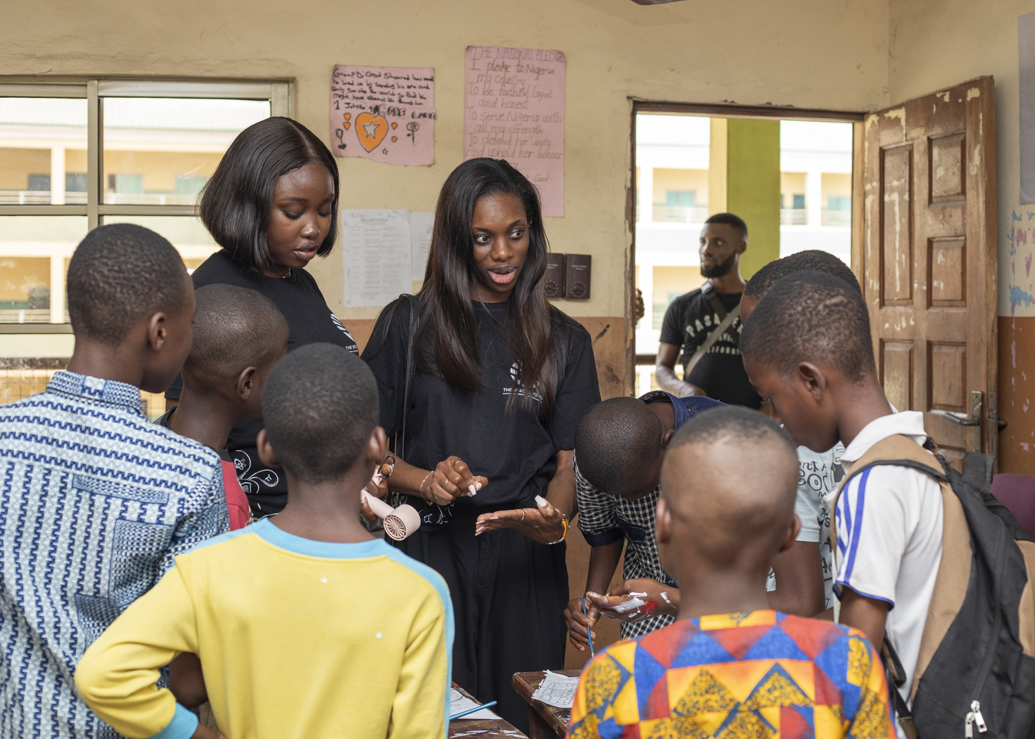 Students keenly listening to tutors at Summer School
